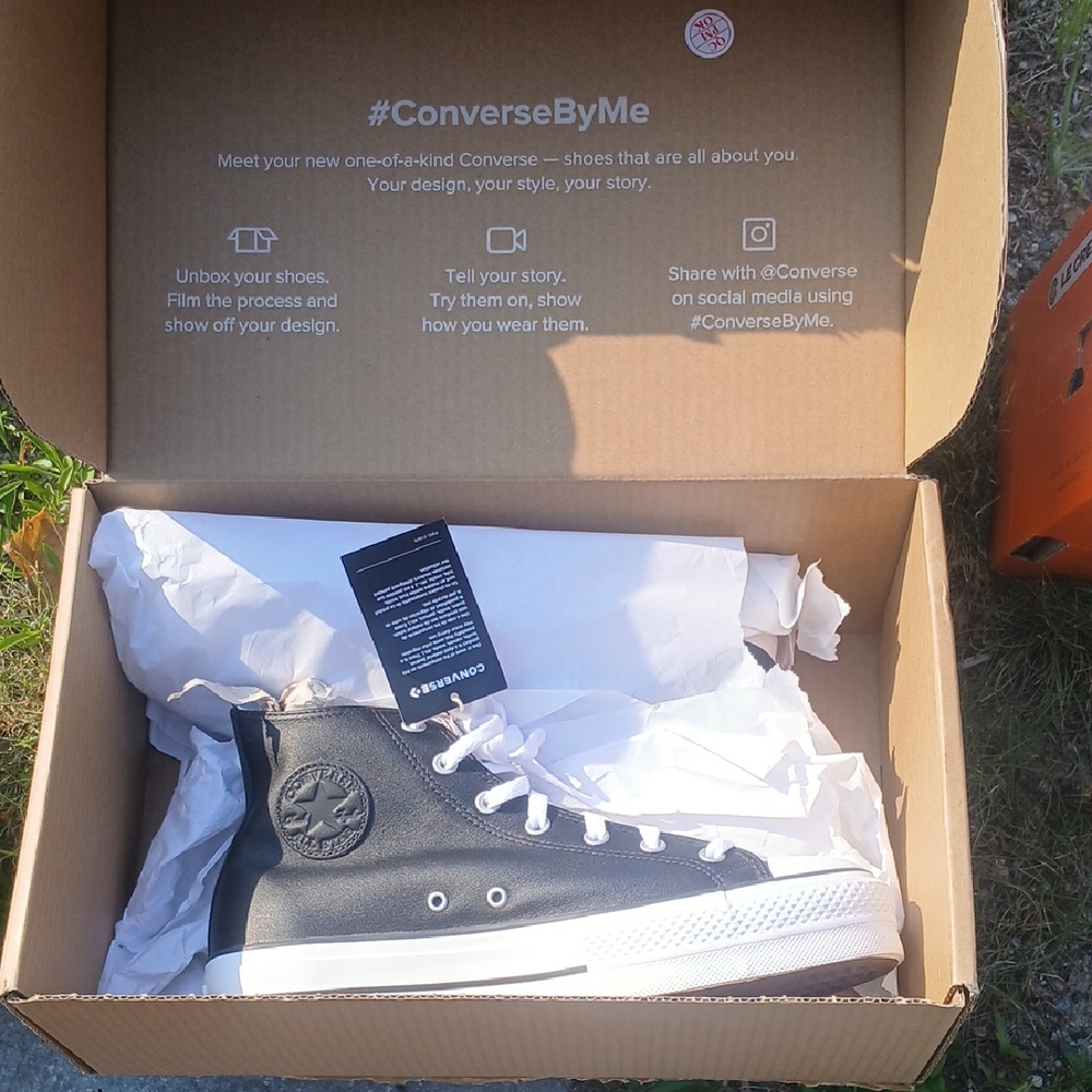 Converse Black and White High-Top Sneakers